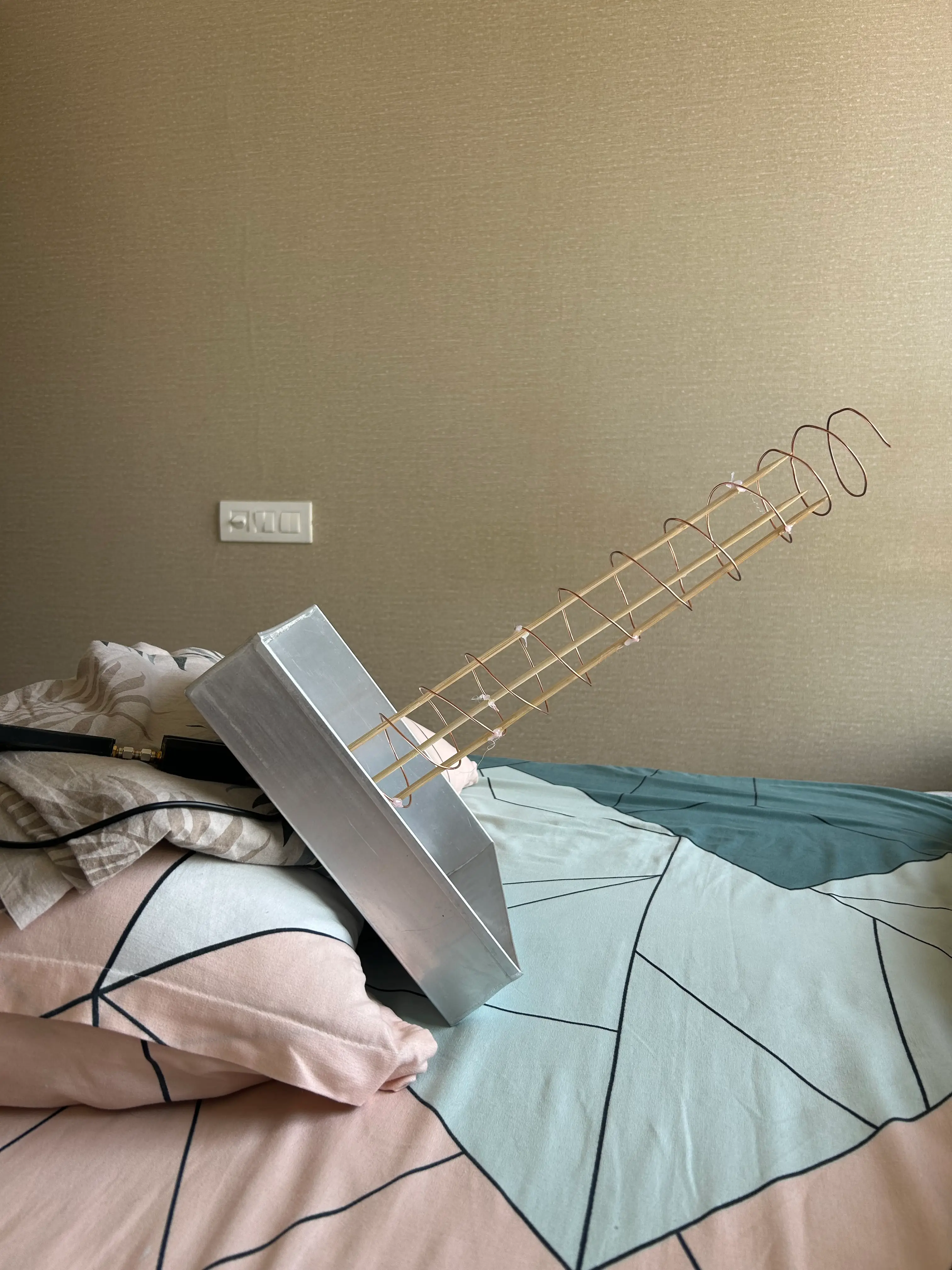 Helix set on my bed pointing outside my window towards Elektro